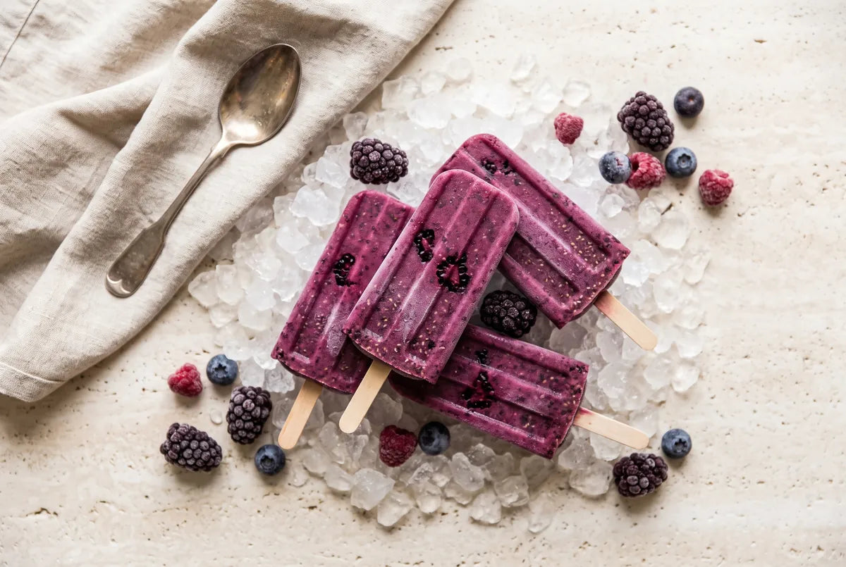 Berry, banana and chia ice cream frozen in moulds with fruit yogurt.