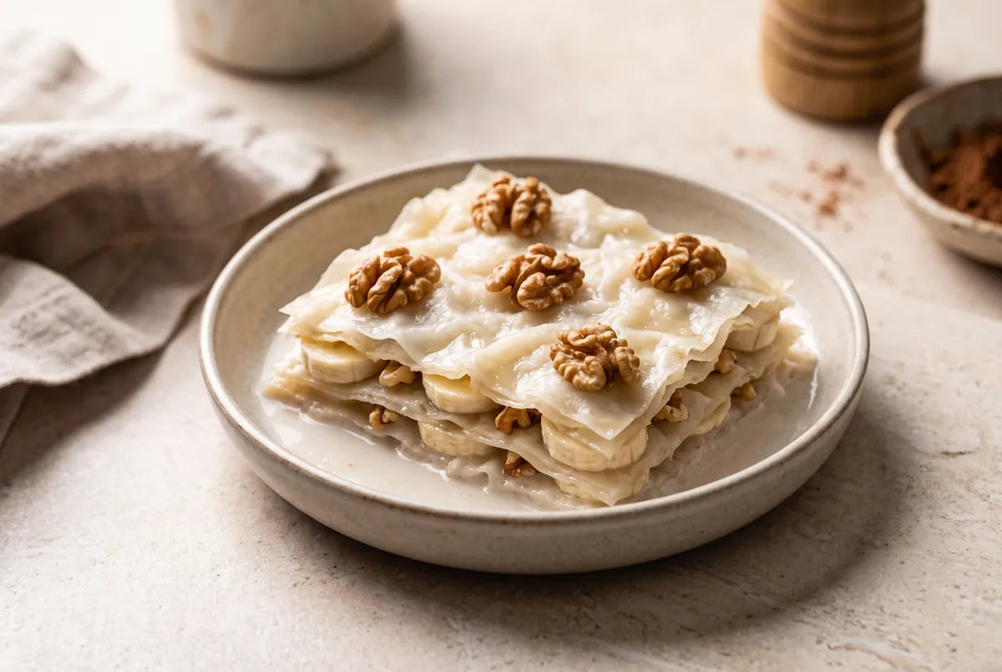 Vegan, refined sugar-free gullac layered with banana and walnuts.